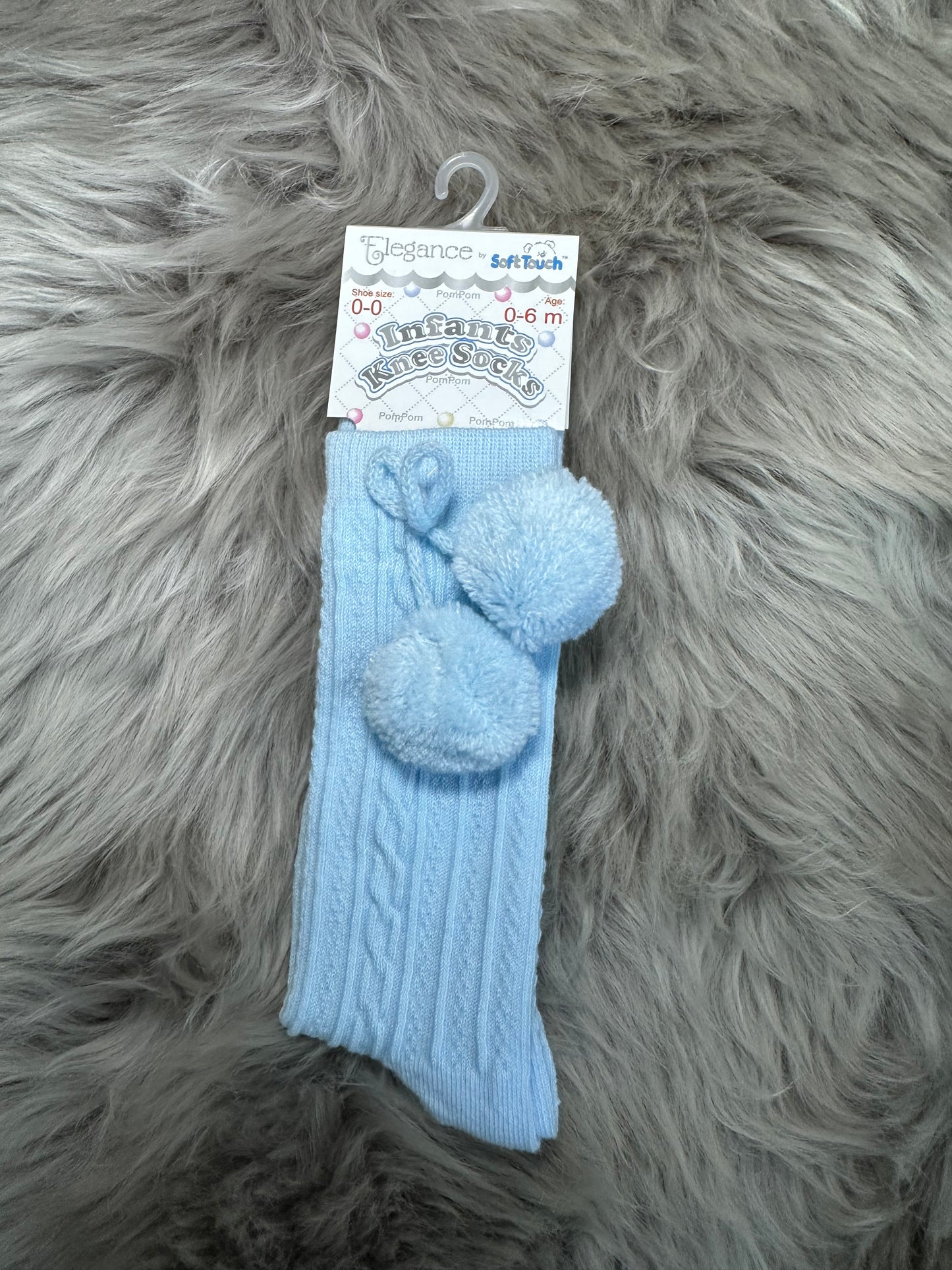 Knee high pom pom socks